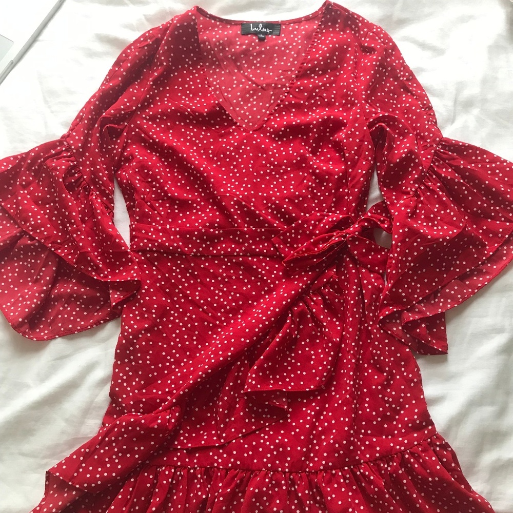 Flirty and flowy red polka dot dress